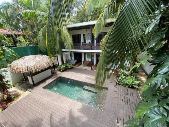 Terrace and his pool at The Urban Sanctuary Lodge hotel and rental income property, for sale at Samara Beach, Guanacaste, Costa Rica