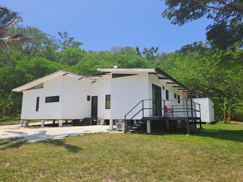 Side view of Casa Jungla Tranquila, home for sale at Samara Beach, Guanacaste, Costa Rica