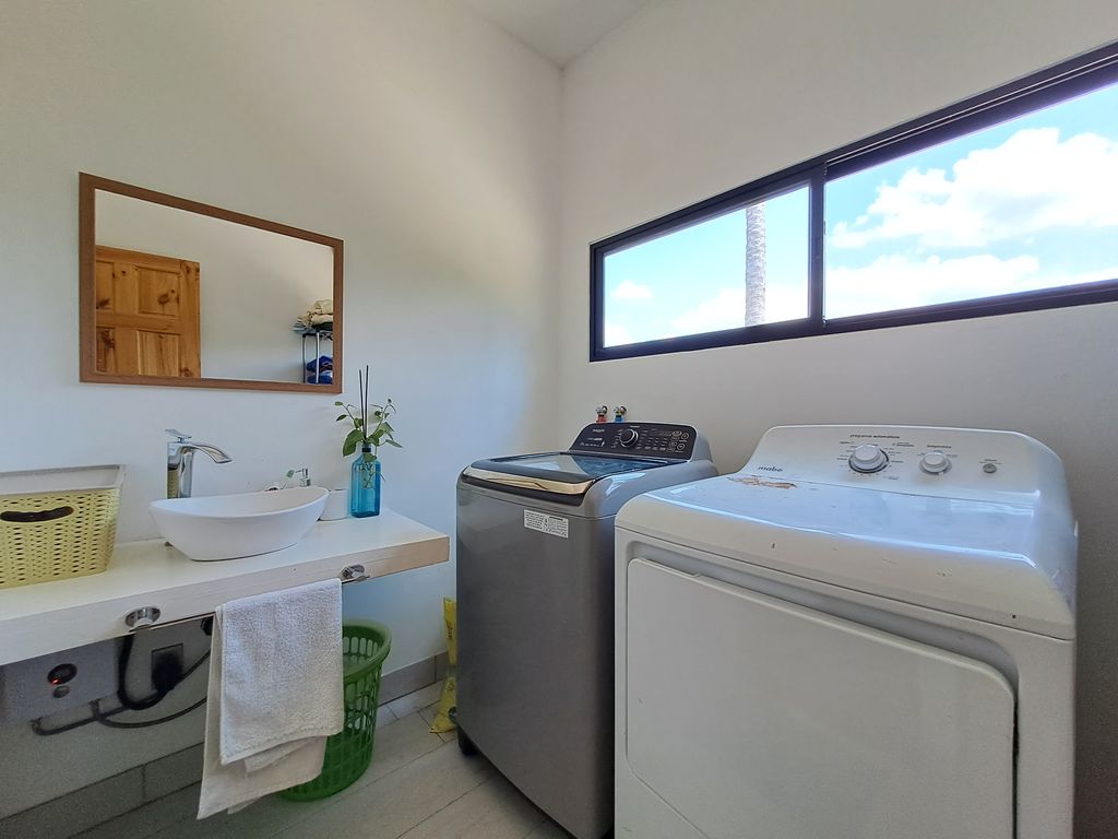 Laundry of Casa Jungla Tranquila, home for sale at Samara Beach, Guanacaste, Costa Rica