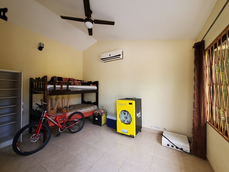 Bedroom with bunkbed at Casa Luz, house for sale at Carrillo Beach, Guanacaste, Costa Rica