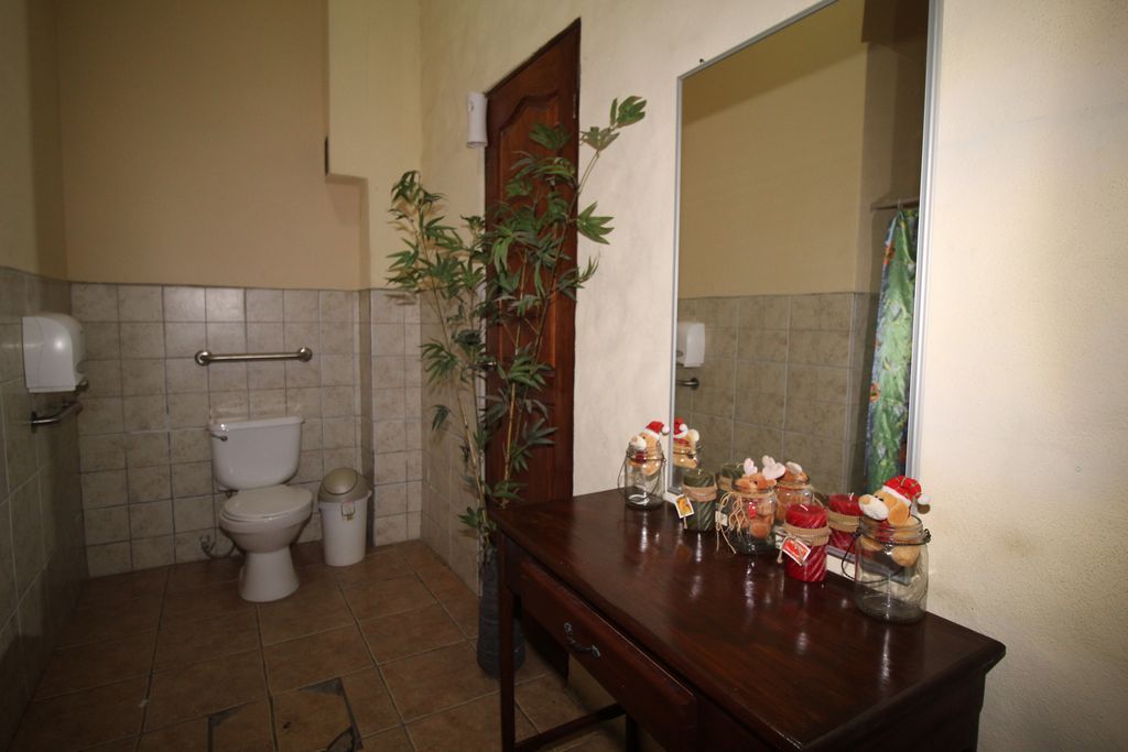 Wooden deck and toilet at Casa Emerald, Restaurant and Cabinas for sale at Samara Beach, Guanacaste, Costa rica