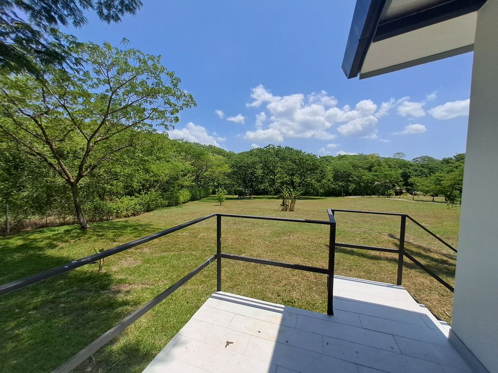 View of the fields from Casa Jungla Tranquila, home for sale at Samara Beach, Guanacaste, Costa Rica