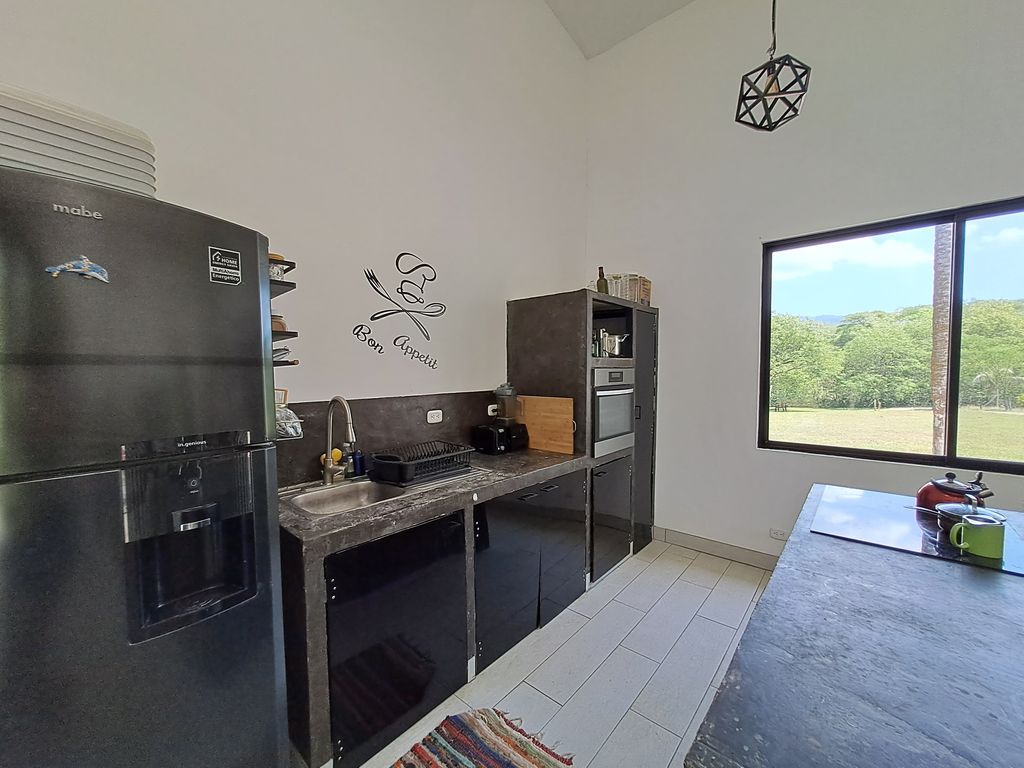 Kitchen of Casa Jungla Tranquila, home for sale at Samara Beach, Guanacaste, Costa Rica