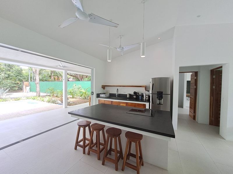 Central kitchen island at Casa Mar y sol home for sale samara guanacaste costa rica