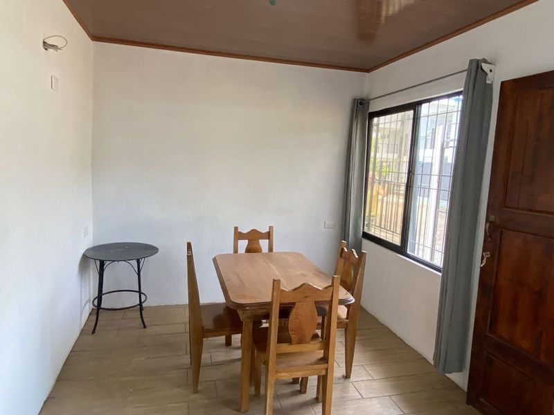 dining table with chairs in Casa Munoz home for sale samara costa rica