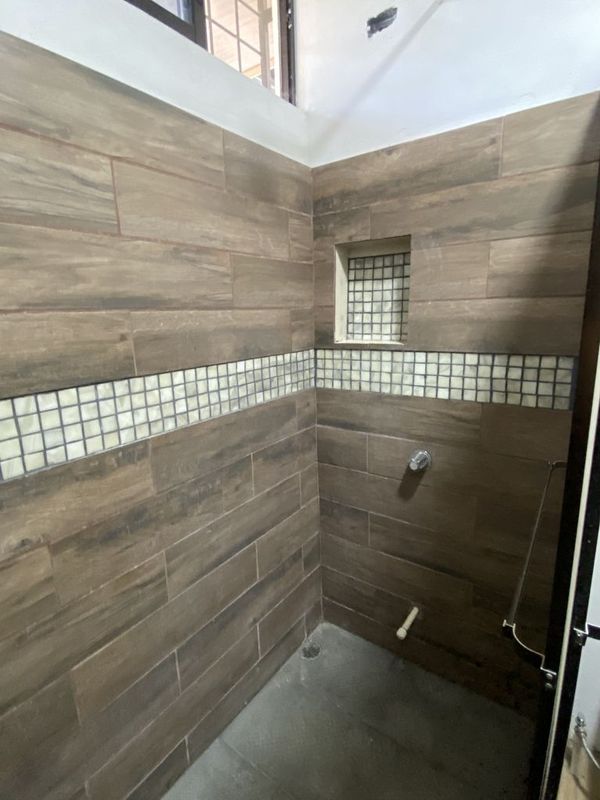 modern tiled shower in Casa Munoz home for sale samara costa rica