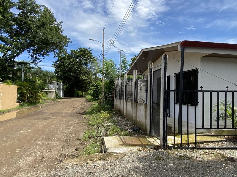 street with Casa Munoz home for sale samara costa rica on the right side