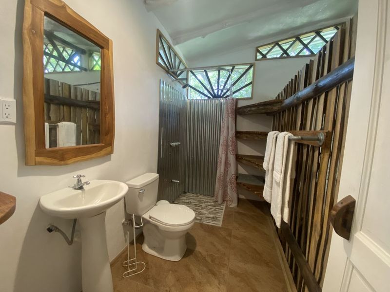 full tropical bathroom at the holistic yoga retreat hotel for sale samara guanacaste costa rica