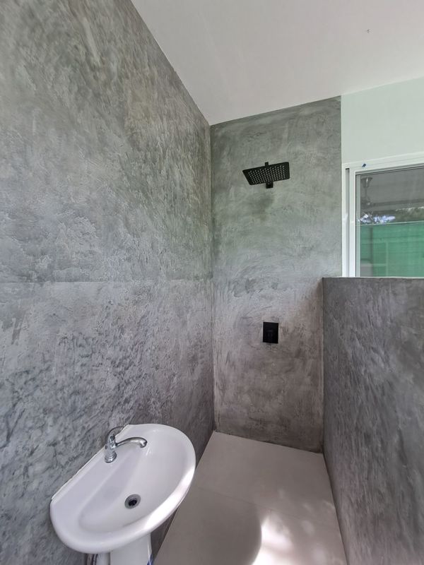 Modern outdoor shower at Casa Mar y sol home for sale samara guanacaste costa rica